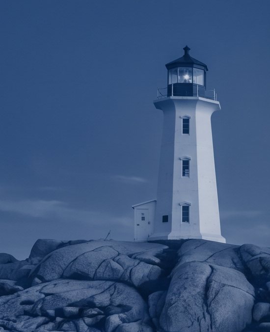Lighthouse on granite rock on the Nova Scotia coast